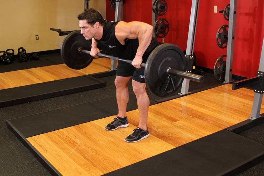 Wide-grip barbell row: end position